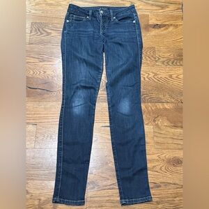 Bebe. Low Rise Skinny Jeans. Resin Rinse. Factory Faded. Size 25.